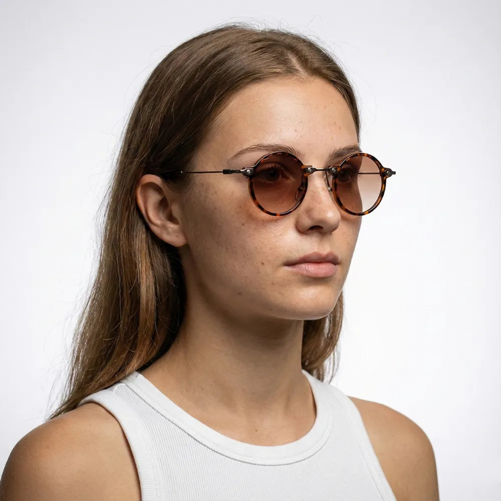 Round acetate sunglasses, model portrait — HARO Sanremo 1947