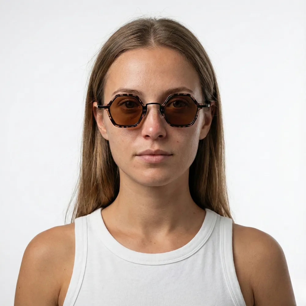 Small hexagonal sunglasses by HARO Eyewear — Cap-Ferrat 1925 editorial